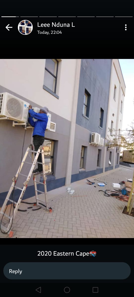PNS ICE technician installing an air conditioner